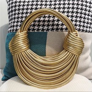 Gold Top handle leather strands bag